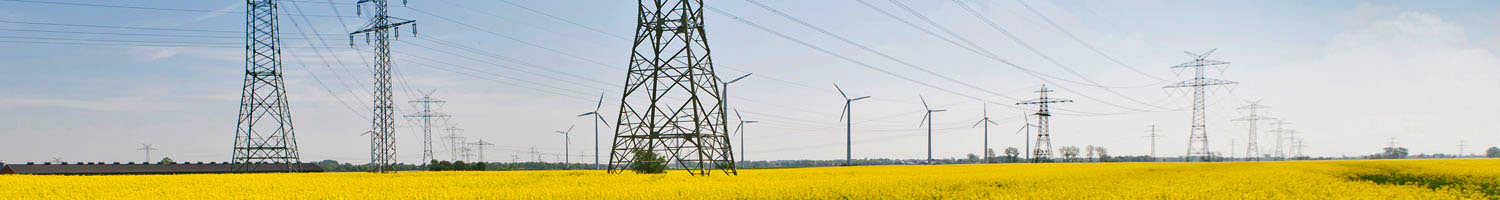 Landscape featuring modern energy infrastructure and renewable energy sources