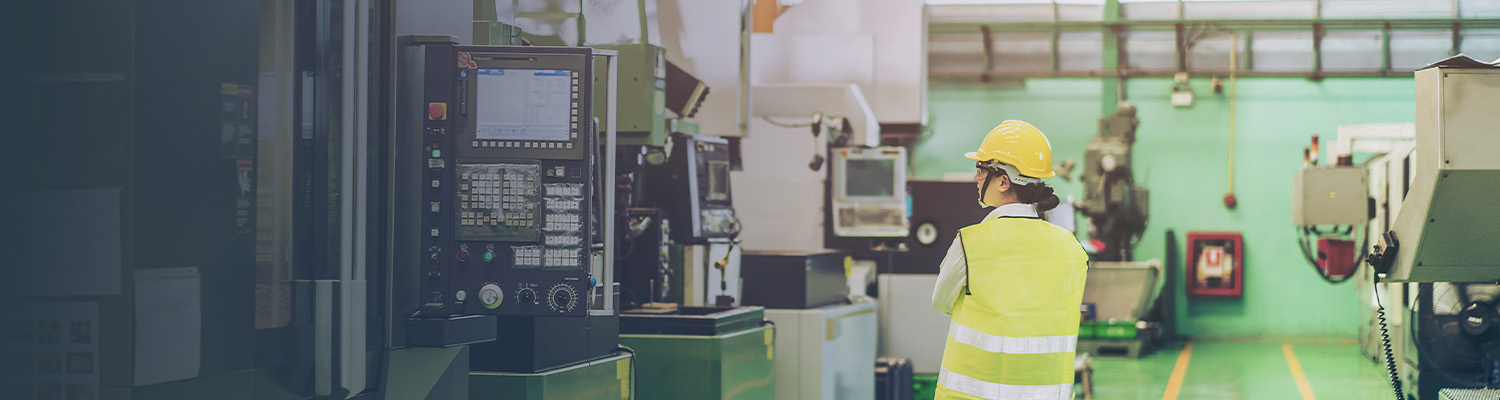 Worker monitoring control systems in an industrial manufacturing facility